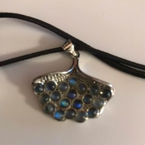 Gorgeous crystal leaf peacock charm on black cord necklace